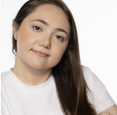 Lauren Grace Zemel close-up headshot, wearing a white top, from her modeling portfolio
